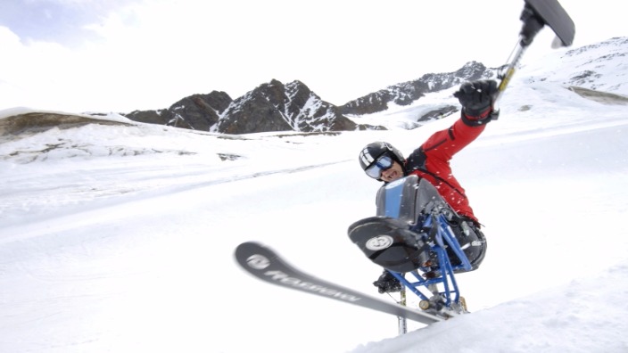 Andy is on the mountain again using a monoski.
